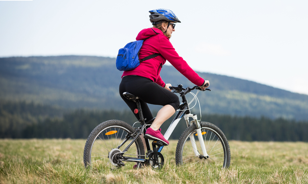woman riding mountain bike
