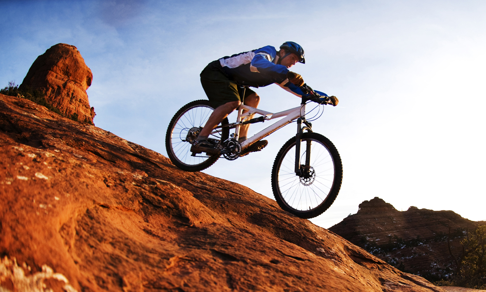 man riding mountain bike