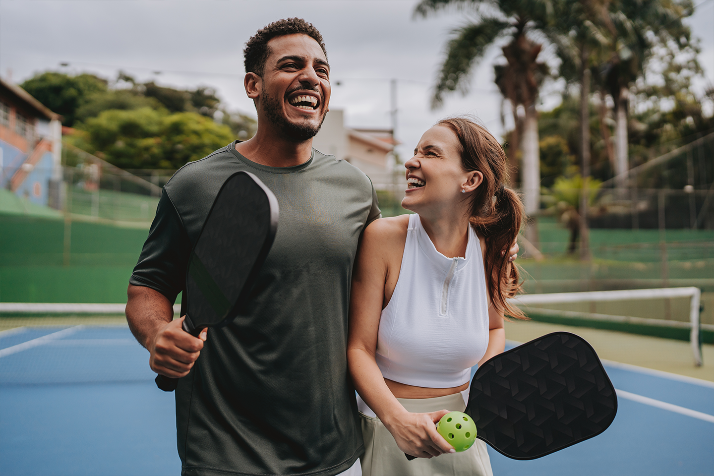 Coouple playing pickleball